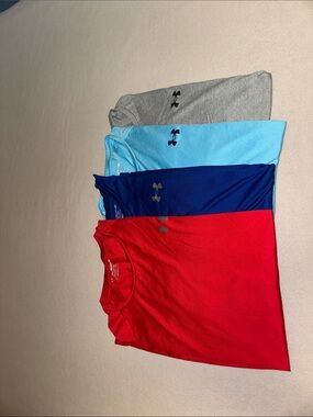 Under Armour Men's Short Sleeve Tees - Red, Blue, Gray and Light Blue.